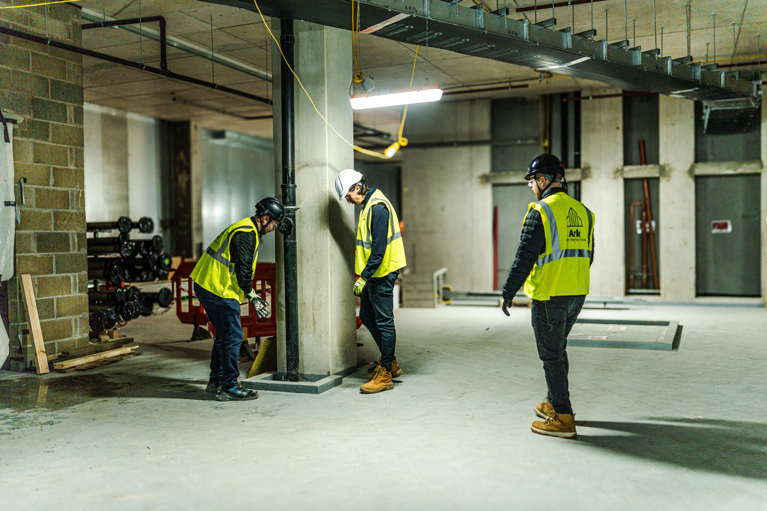 Ark team inspecting works on site.